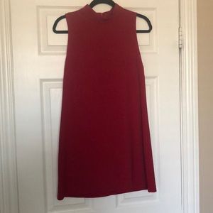High neck red dress.